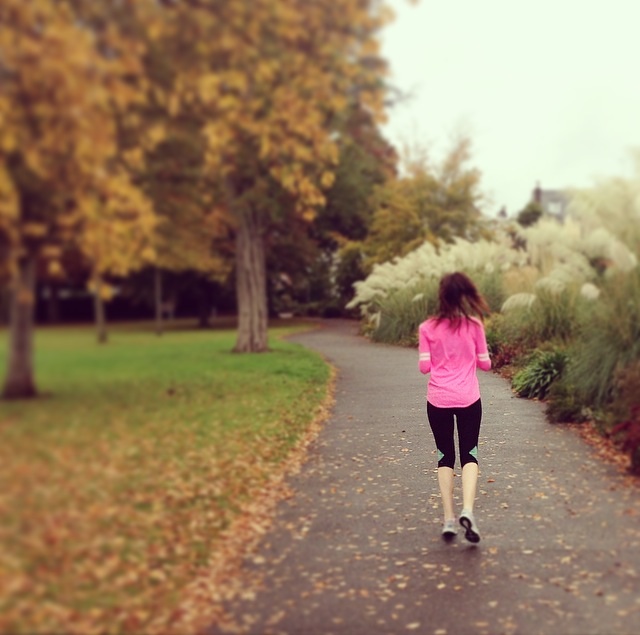 running in the autumn leaves